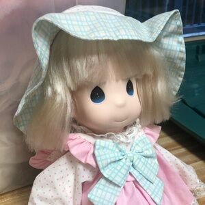 Adorable Pink and White Doll with Blue Accents